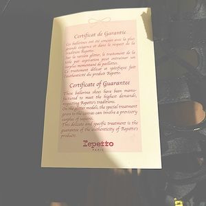 Black knee high laced flats.